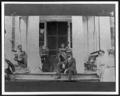 Governor Carr and family on the front porch of Bracebridge Hall
